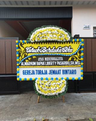 Papan Bunga Duka di Sawoo